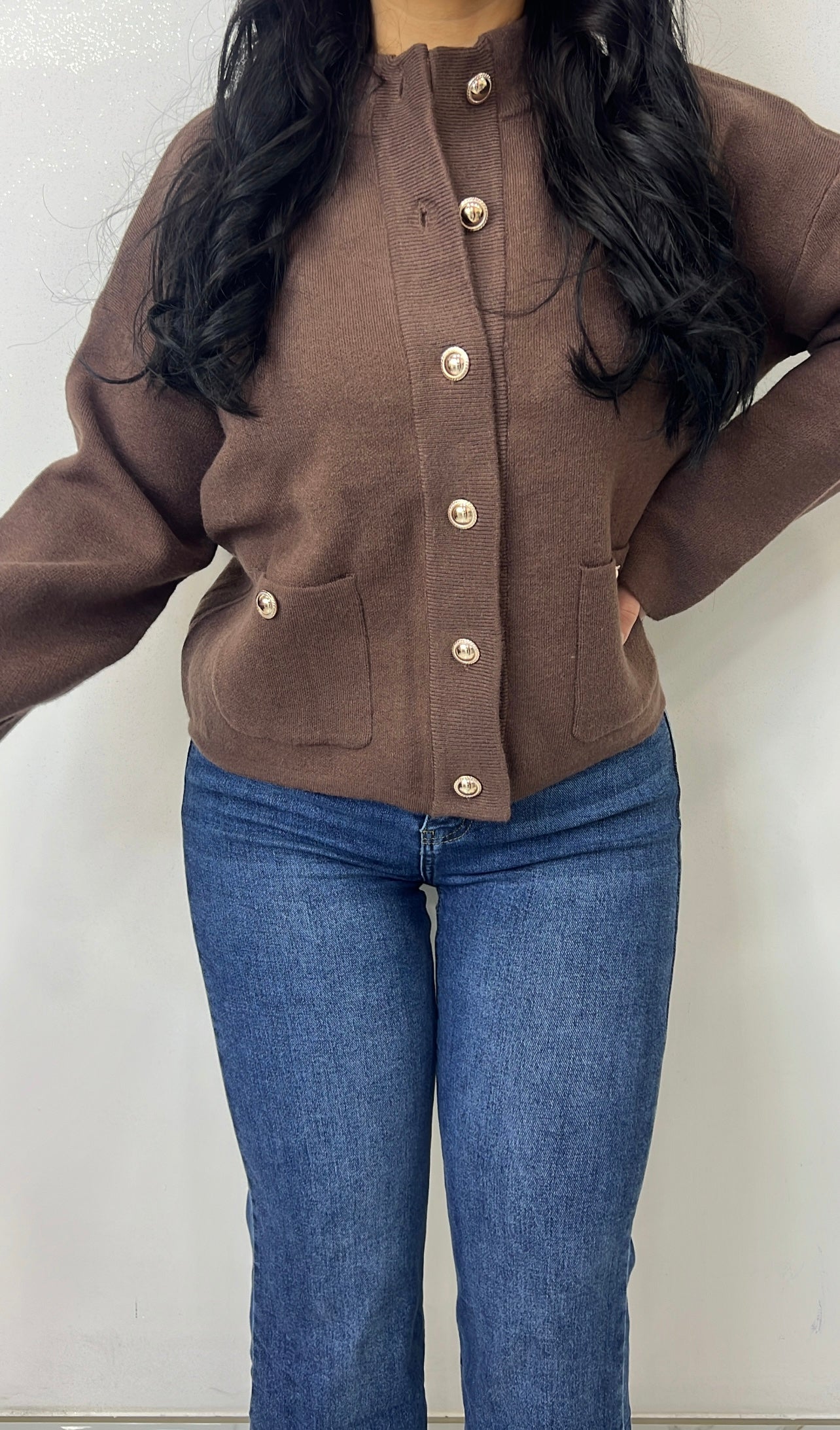 Gilet en maille à bouton doré