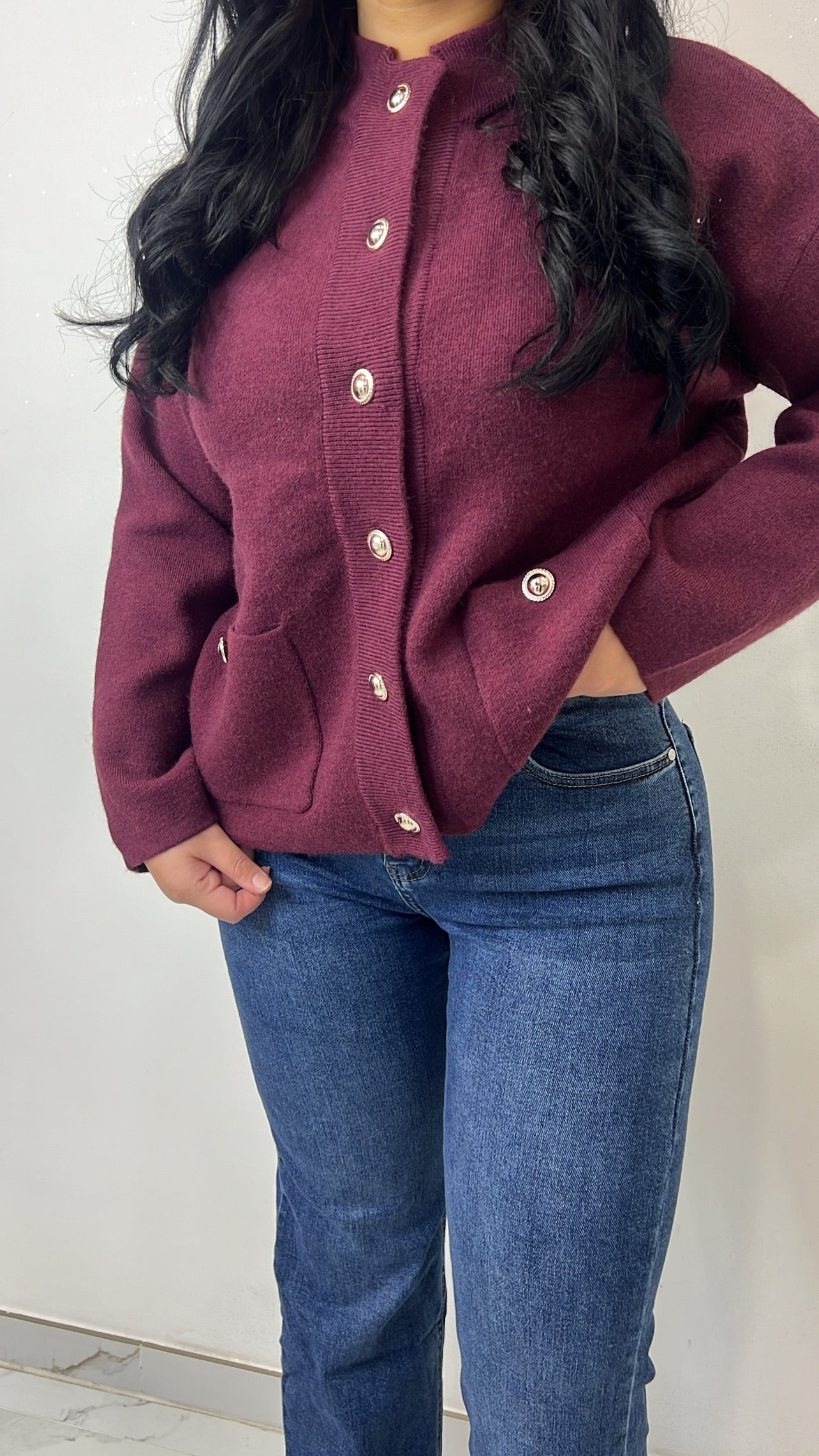 Gilet en maille à bouton doré